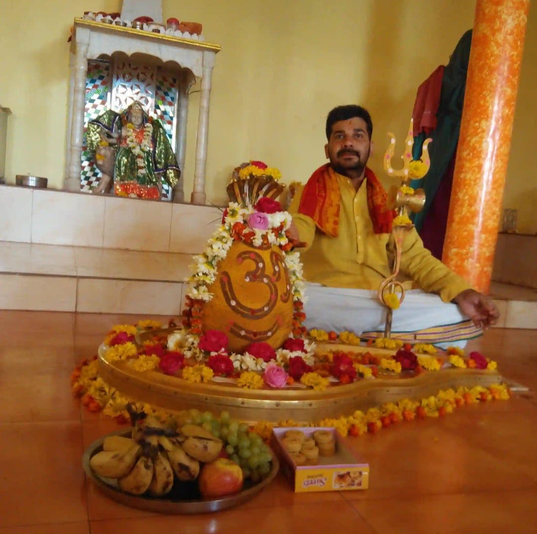 Pandit Gopal Krishna Sharma - Your Guide for Vedic Pujas, Astrology, and Vastu Pandit Gopal Krishna Sharma, an expert Vedic Pandit and astrologer in Ujjain and Indore, performing a traditional puja ceremony.
